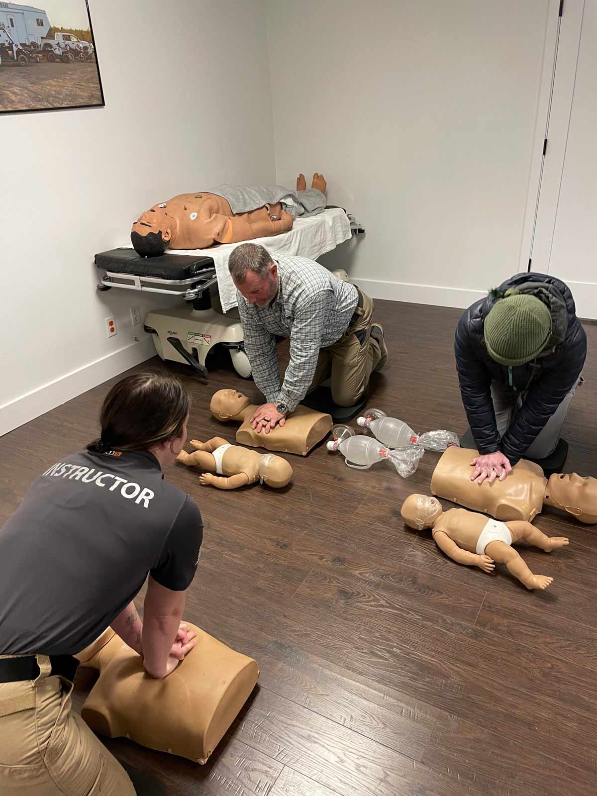 Class of students learning CPR